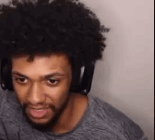 Man With Beard and Headphones Making Funny Face