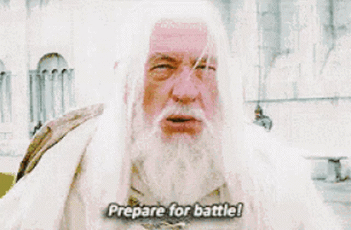 Man With Beard And Long White Hair Says Prepare For Battle GIF