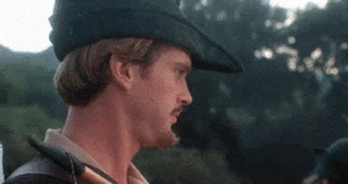 Man With Beard And Mustache Holding Sword GIF