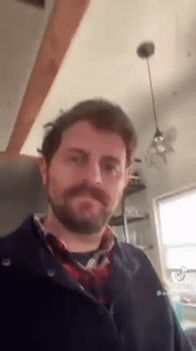 Man With Beard And Mustache In Kitchen GIF