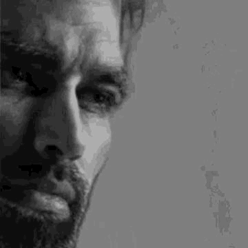 Man with Beard and Mustache Looking Down