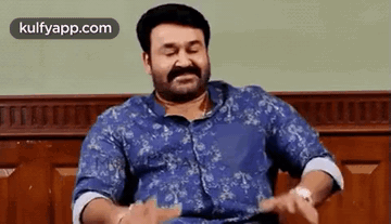 Man With Beard And Mustache Sitting Eyes Closed GIF