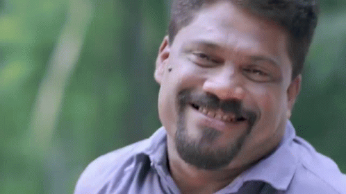 Man With Beard and Mustache Smiling