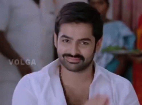Man With Beard And Mustache Smiling In White Shirt GIF