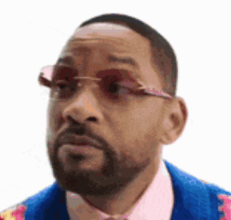 Man With Beard and Sunglasses in Pink Shirt