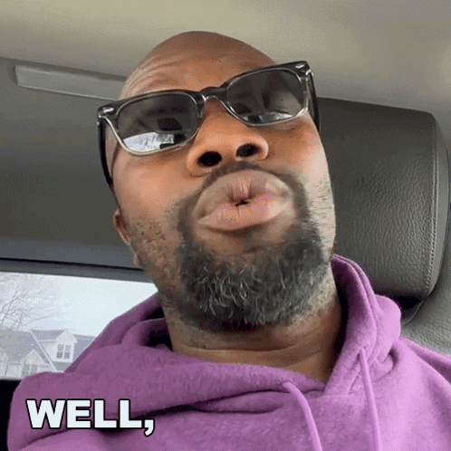 Man with Beard and Sunglasses Saying Well