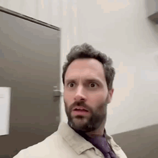 Man With Beard and Tie Funny Face at Door