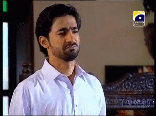 Man With Beard And White Shirt In Front Of Geo TV GIF