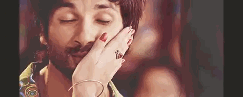 Man With Beard and Woman's Hand