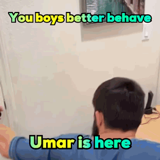 Man With Beard at Door Saying You Boys Better Behave Umar Is Here