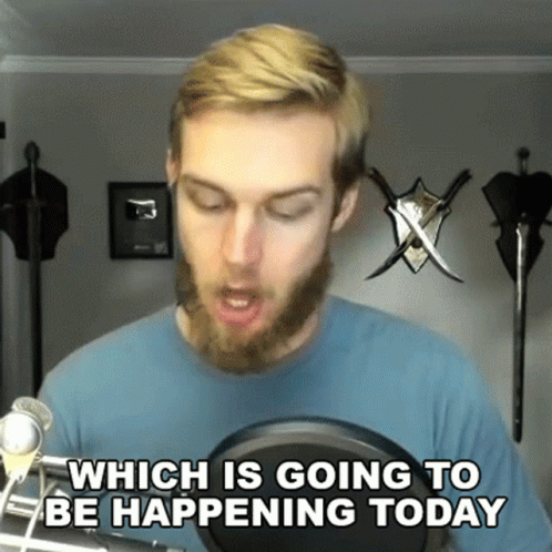 Man With Beard At Microphone Saying Which Happens Today