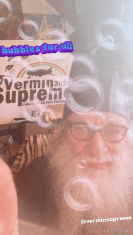Man with Beard Blowing Bubbles Vermin Supreme