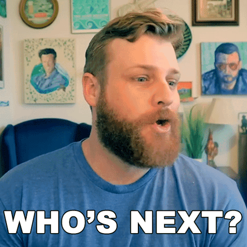 Man With Beard Blue Shirt Says Who's Next GIF