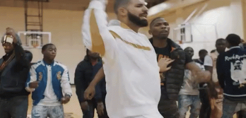 Man with Beard Dancing on Basketball Court