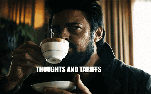 Man With Beard Drinking Coffee Thoughts And Tariffs GIF