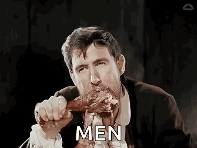 Man with Beard Eating Meat