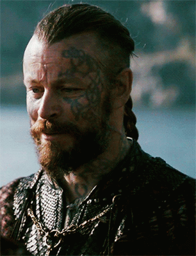 Man With Beard, Face Tattoos, And Chain GIF