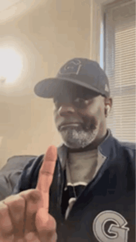 Man with Beard Giving Thumbs Up