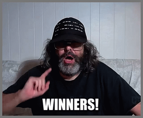 Man with Beard Glasses and Hat Says Winners