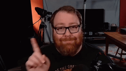 Man with Beard Glasses and Off the Grf Shirt