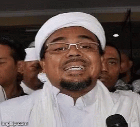 Man With Beard, Glasses, And White Turban Smiling GIF