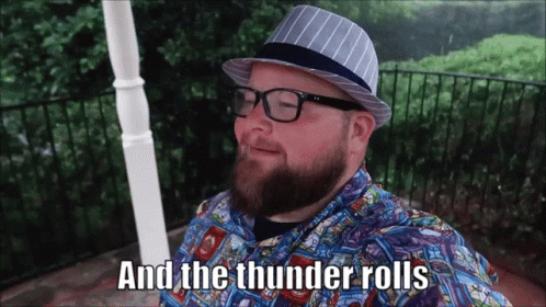 Man With Beard Glasses Hat And The Thunder Rolls