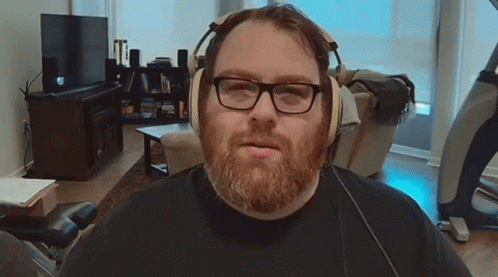 Man with Beard Headphones and Glasses