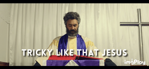 Man With Beard Holding Book Saying Tricky Like That Jesus GIF