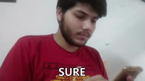 Man With Beard Holding Cell Phone GIF