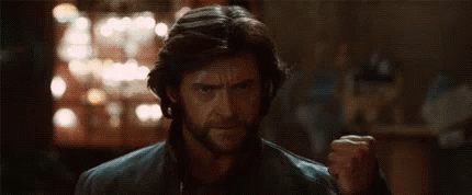 Man With Beard Holding Claws GIF