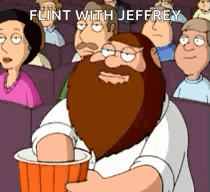 Man with Beard Holding Flint Cup