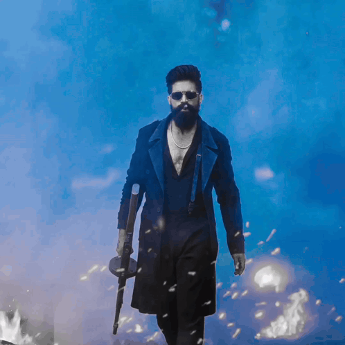 Man With Beard Holding Gun GIF