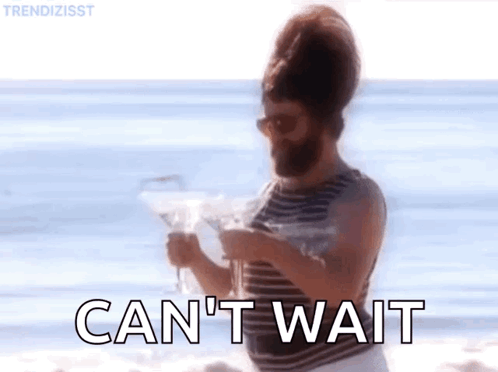 Man with Beard Holding Martini