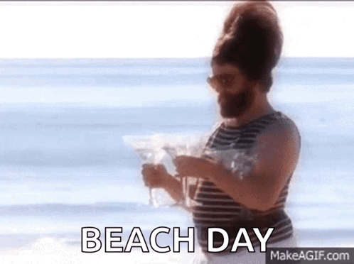 Man with Beard Holding Martini on Beach