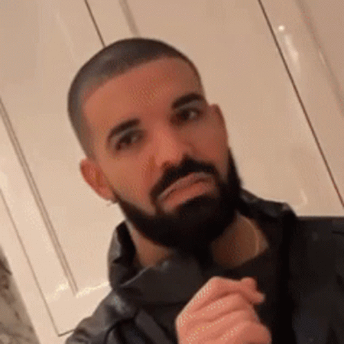 Man With Beard Holding Microphone GIF