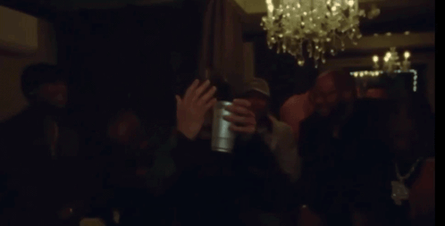 Man With Beard Holding Silver Cup