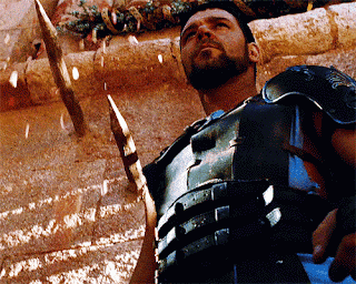 Man With Beard Holding Sword GIF