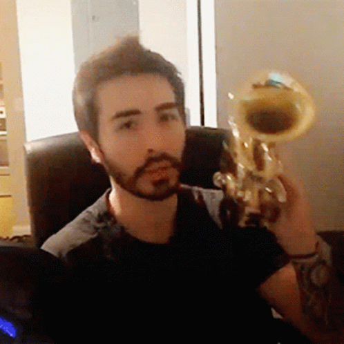 Man with Beard Holding Trumpet