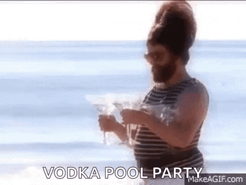 Man with Beard Holding Vodka at Pool