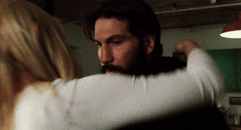 Man with Beard Hugging Blonde Woman