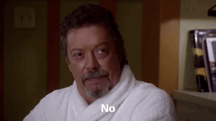 Man With Beard in Bathrobe Saying No