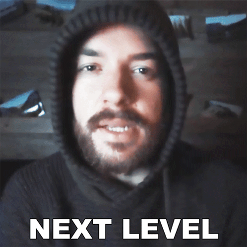 Man With Beard in Black Hoodie Saying Next Level