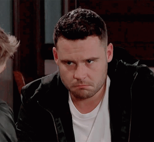 Man With Beard In Black Jacket And White T-Shirt GIF