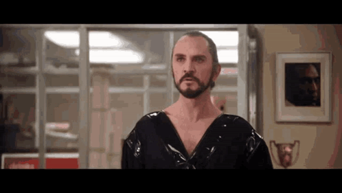 Man with Beard in Black Robe