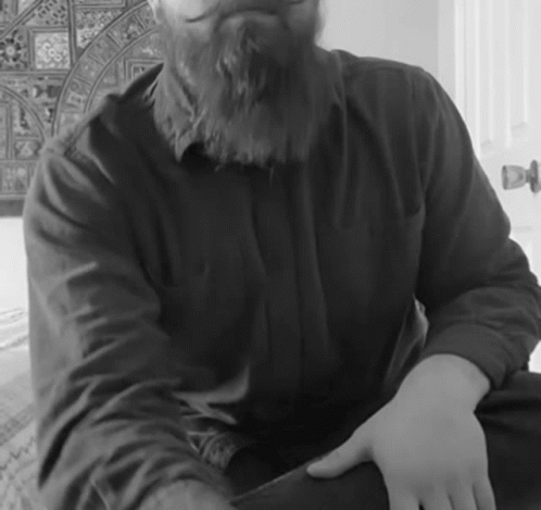 Man with Beard in Black Shirt