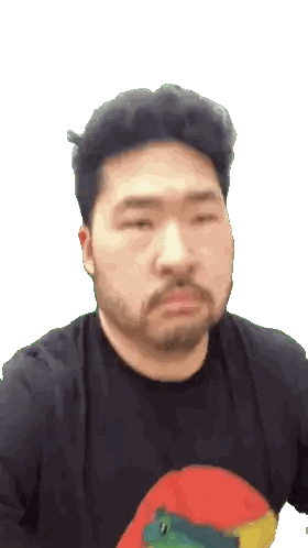 Man with Beard in Black Shirt and Colorful Frog