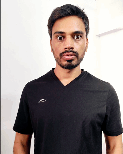 Man with Beard in Black T-Shirt with Letter A