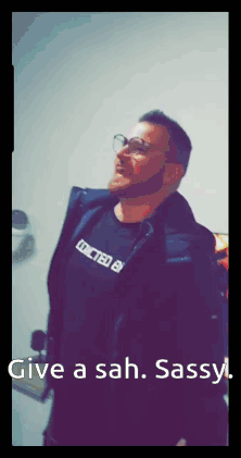 Man with Beard in Black United Shirt