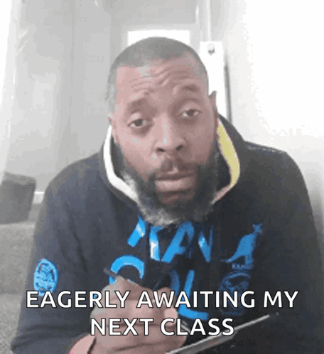 Man with Beard in Blue Eagle Shirt