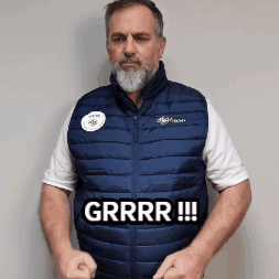 Man with Beard in Blue Grr Vest